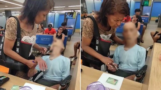 Mulher leva morto em cadeira de rodas para sacar empréstimo de R$17 mil e pede a ele: 'Assina' VÍDEO
